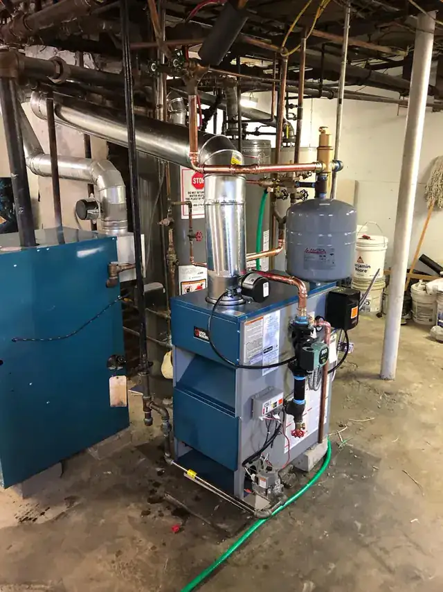 Boiler and near-boiler piping replaced by Buresh Plumbing